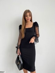 Вишукана сукня чорного кольору, в розмірі 42-44, 46-48.