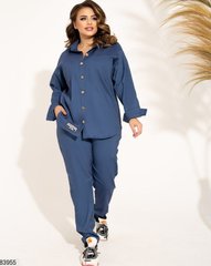 Однотонний брючний костюм із сорочкою з джинсової тканини синього кольору у розмірі 48-50, 52-54, 56-58
