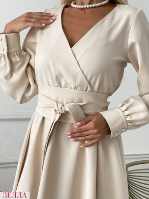 Елегантна сукня в розмірі 42-44, 46-48, колір кремовий.