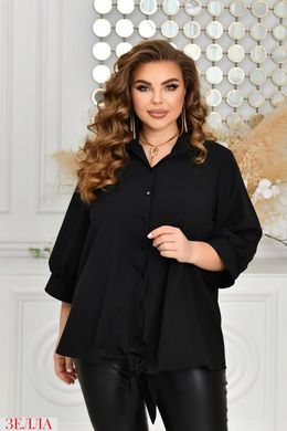 Блуза вільного силуету в розмірі 48-50, 52-54, 56-58, 60-62, 64-66, колір чорний.