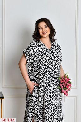 Подовжена сукня з кишенями в розмірі 48-50, 52-54, 56-58, колір ланцюжок сірий з білим.