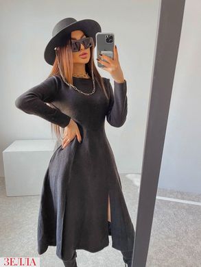 Демісезонна сукня в універсальному розмірі 42-46, колір чорний.