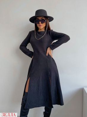 Демісезонна сукня в універсальному розмірі 42-46, колір чорний.