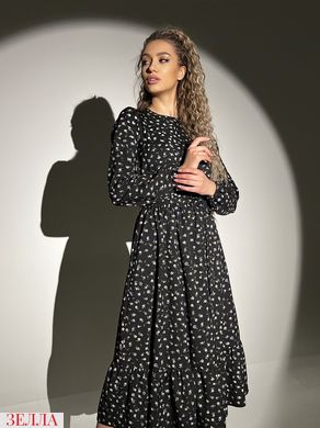 Сукня в горошок чорного кольору, в розмірі 42-44, 46-48.