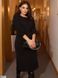 Жіноча трикотажна приталена сукня середньої довжини - міді з об'ємним рукавом колір чорний розмір: 58-60
