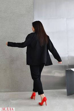 Класичний однотонний костюм ділового стилю в розмірі 48-50, 52-54, 56-58, колір чорний.