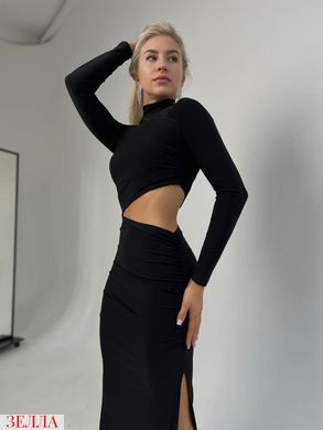 Сукня з акцентним вирізом на талії та розрізом на нозі в універсальному розмірі 42-46, колір чорний.
