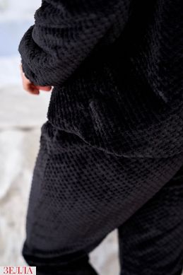 Тепла піжама чорного кольору, в розмірі 42-44, 46-48.