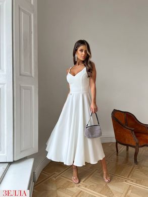 Подовжена сукня в розмірі 42, 44, 46, колір молочний.