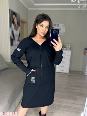 Сукня з кишенями в розмірі 50-52, 54-56, 58-60, колір чорний.