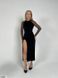 Ефектна сукня з глибоким фігурни розрізом в розмірі 42-44, 46-48, колір чорний.