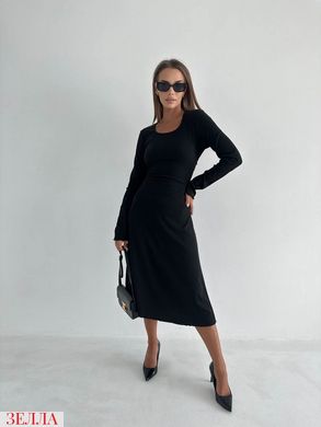 Подовжена сукня в розмірі 42-44, 46-48, колір чорний.