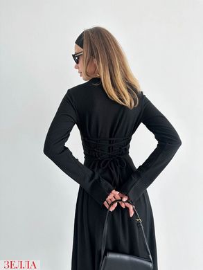 Подовжена сукня в розмірі 42-44, 46-48, колір чорний.