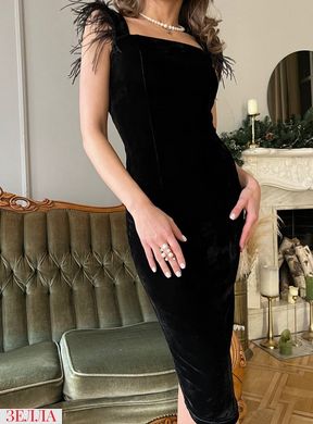 Оксамитова сукня чорного кольору, в розмірі 42-44, 46-48.
