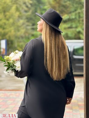 Блузка в розмірі 52-54, 56-58, 60-62, 64-66, колір чорний.