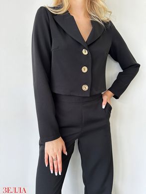 Елегантний костюм двійка в розмірі 42, 44, колір чорний.