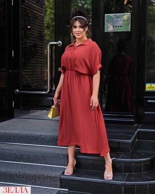 Подовжена сукня в розмірі 46-48, 50-52, 54-56, колір теракотовий.