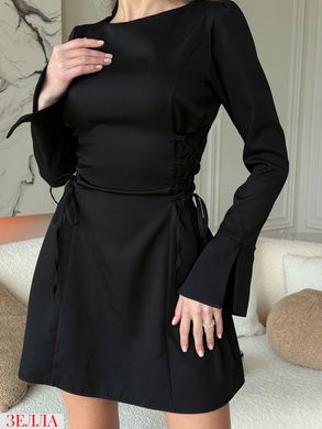Елегантна сукня в розмірі 42-44, 46-48, колір чорний.