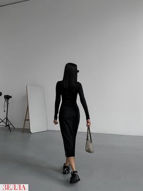 Подовжена облягаюча сукня в розмірі 42-44, 46-48, колір чорний.