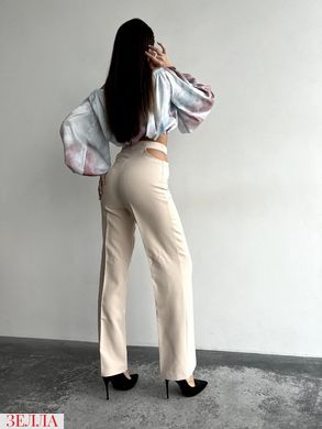 Трендові штани кльош бежевого кольору, в розмірі 42-44, 46-48.