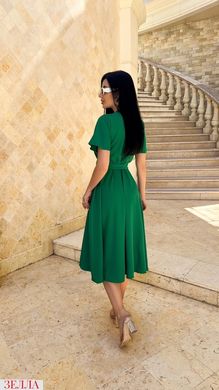 Сукня на запах в розмірі 42-44, 46-48, колір зелений.