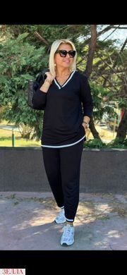 Костюм двійка з білим обкантуванням в розмірі 48-50, 52-54, 56-58, 60-62, колір чорний.