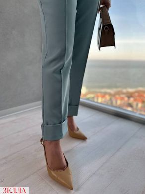 Класичні брюки в розмірі 50-52, 54-56, 58-60, колір оливковий.