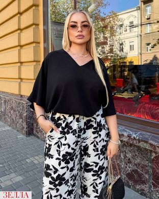Костюм для активного ритму в розмірі 50-52, 54-56, 58-60, колір чорний.