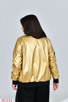 Куртка-бомбер в розмірі 48-50, 52-54, 56-58, колір золотий.