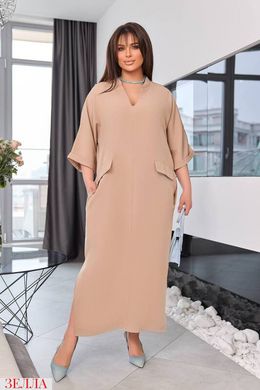 Елегантна сукня з кишеням в розмірі 48-50, 52-54, 56-58, колір нюд.