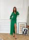 Довга жіноча сукня з розрізом, зеленого кольору, в розмірі 42, 44, 46.