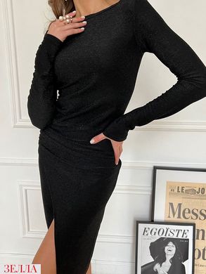 Вишукана облягаюча сукня чорного кольору, в розмірі 42-44, 46-48.