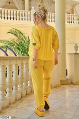 Прогулянковий костюм в розмірі 48-50, 52-54, 56-58, колір жовтий.