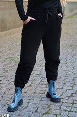 Штани-джоггери чорного кольору, в розмірі 48-50, 52-54, 56-58.
