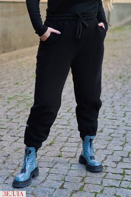 Штани-джоггери чорного кольору, в розмірі 48-50, 52-54, 56-58.