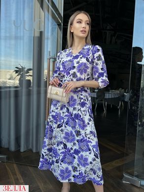 Сукня в квіти в розмірі 42-44, 46-48, колір фіолетовий.