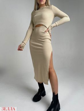 Приталена сукня в рубчик в розмірі 42-44, 46-48, колір світло-бежевий.