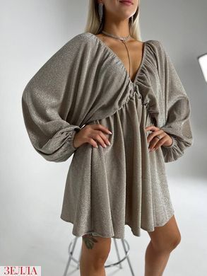 Сяюча сукня в розмірі 42-48, колір золото.